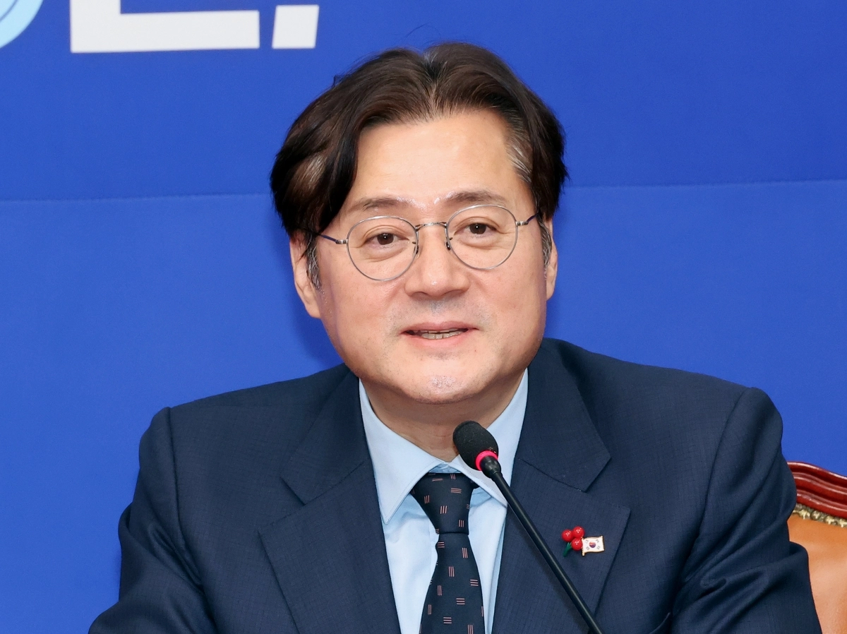 정청래 대표 만난 홍익표 정무수석