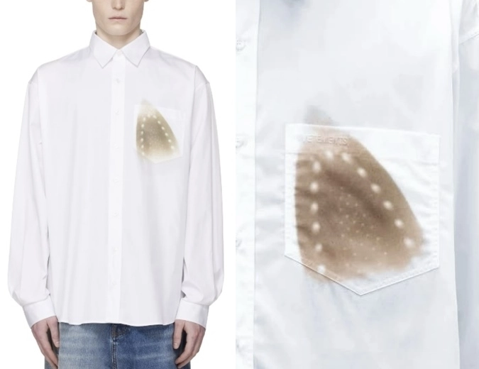 프랑스의 명품 스트릿 패션 브랜드 ‘베트멍’이 최근 출시한 ‘화이트 아이로닝 번 그래픽 셔츠’. 면 100% 소재의 셔츠 왼쪽 가슴 부분에 다림질하다 태운 자국을 본뜬 디자인이 프린트돼 있다. 160만원대에 판매 중이다. 자료 : 베트멍 공식 홈페이지