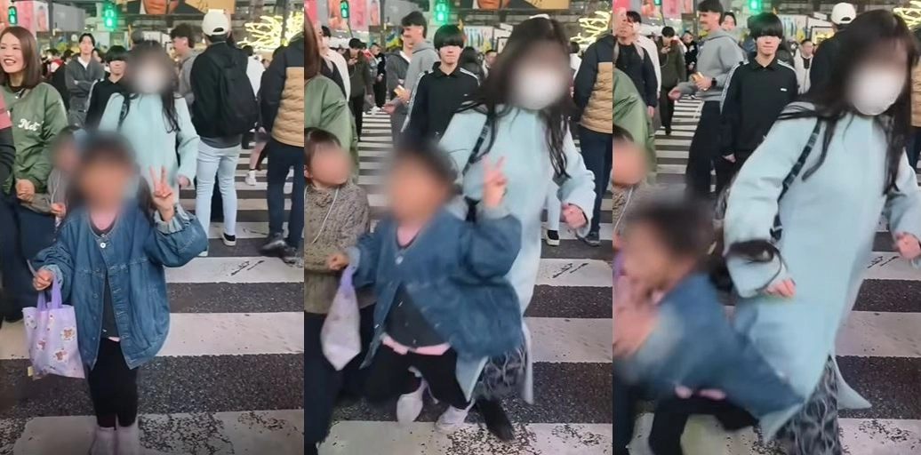 일본 도쿄 시부야 ‘스크램블 교차로’에서 대만 소녀가 카메라를 향해 V(브이) 자를 그리며 웃는 순간, 인파 속에서 마스크를 쓴 여성이 나타나 소녀를 뒤에서 세게 밀쳐 넘어뜨리는 모습. 소셜미디어(SNS) 캡처