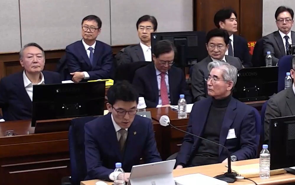 윤석열 전 대통령, 김용현 전 국방부 장관 등이 지난 1월 9일 서울 서초구 서울중앙지방법원에서 열린 내란 우두머리 혐의 1심 결심 공판에 출석해 자리에 앉아 있다. 뉴스1