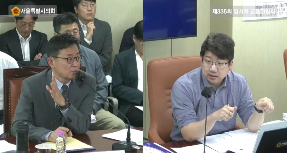 추경안에 대해 질의응답 진행 중인 문성호 의원(오른쪽)과 여장권 서울시 교통실장