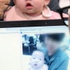 수서경찰서 부스에서 지문 등록하는 신생아