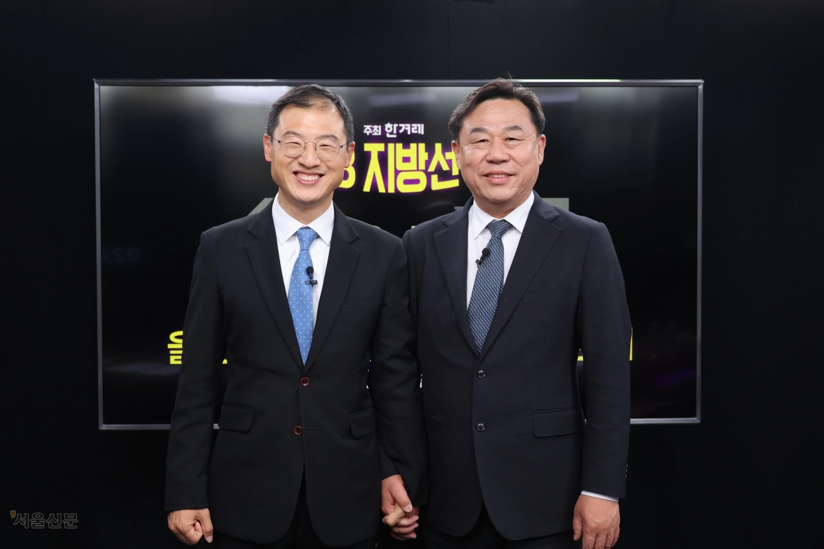 김상욱(왼쪽) 더불어민주당 울산시장 후보와 김종훈 진보당 울산시장 후보.