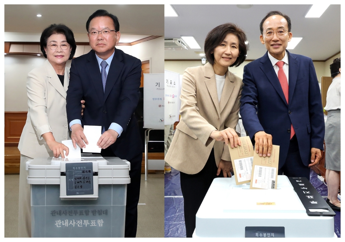 김부겸 더불어민주당 대구시장 후보(오른쪽)와 부인 이유미 씨가 29일 오전 대구 수성구 고산2동 행정복지센터에 마련된 사전투표소에서 투표하고 있다. 같은 날 추경호 국민의힘 대구시장 후보(오른쪽)와 배우자 김희경 씨도 대구 수성구 수성구의회에 마련된 범어1동 사전투표소에서 투표를 마쳤다.  2026.5.29. 뉴스1