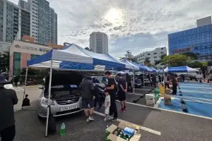 귀성길 안전하게… 주민 차량 살피는 구로