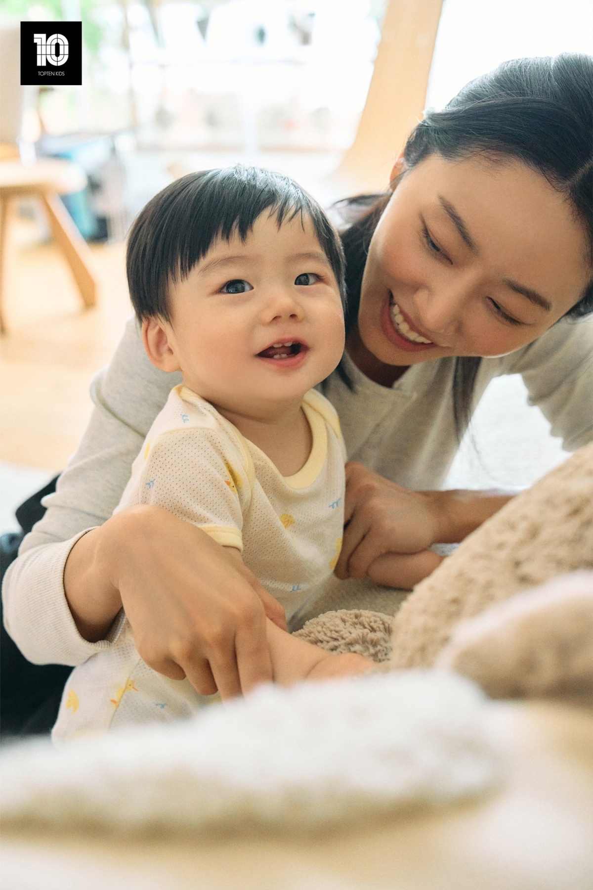 신성통상 탑텐키즈 ‘우리 아이의 첫 바디수트’ 브랜드 콘텐츠 속 한 장면. 신성통상 제공