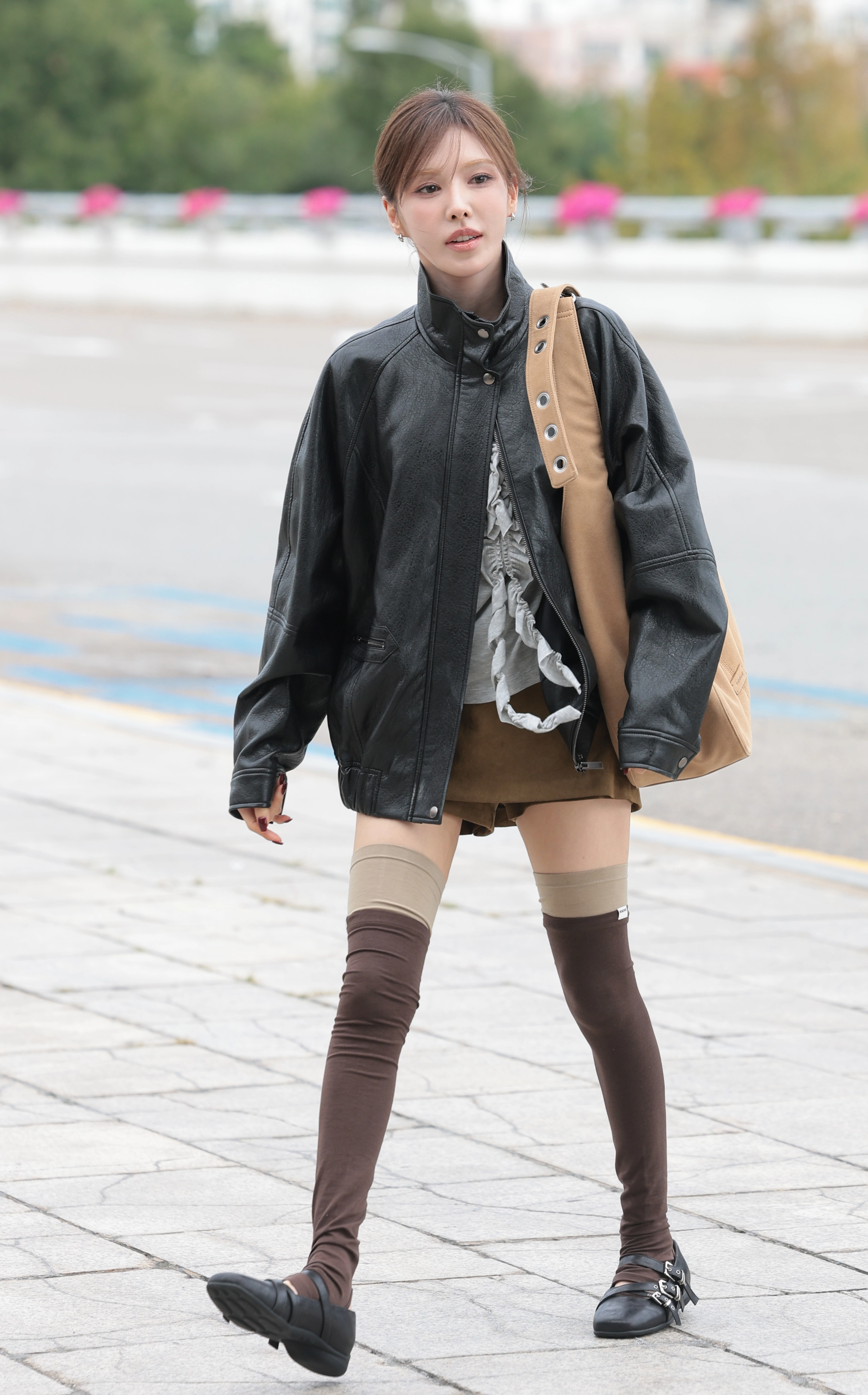 레드벨벳 웬디가 해외 일정을 위해 17일 김포공항을 통해 일본 도쿄로 출국하기 전 인사를 하고 있다. 2026.9.17.<br>뉴스1