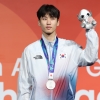 클라이밍 남녀 모두 해냈다! 이도현 은메달·정지민 동메달 터치